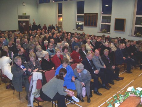 The audience assembles