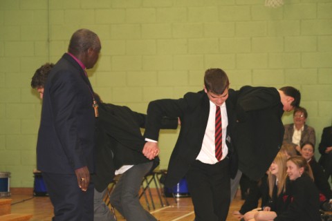 The Archbishops gets some pupils to illustrate his point